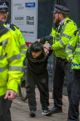 . 04 05 2026. London, United Kingdom. London May Day March. Police detain two men at the annual London May Day March from Clerkenwell Green to Trafalgar Square.where a rally is held.  xMartynxWheatleyx xi-Imagesx IIM-26745-0007