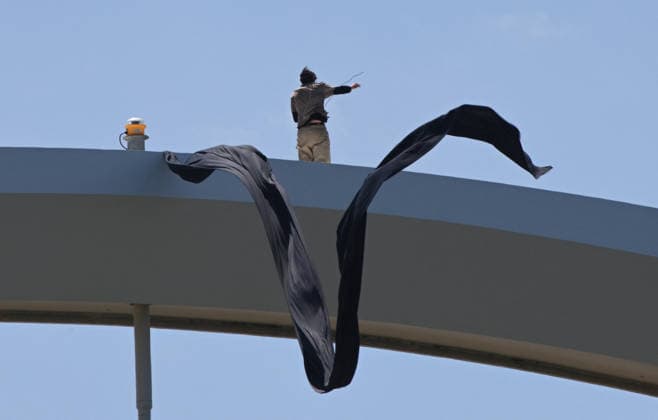Guido Reichstadter protests against the war in Iran atop a Bridge in Washington Guido Reichstadter gestures as he protests against the war in Iran atop the Frederick Douglass Memorial Bridge for the fourth day, in Washington, DC on May 4, 2026. Photo by Olivier Douliery ABACAPRESS.COM Washington DC United States  Copyright: xDoulieryxOlivier ABACAx