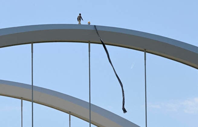 Guido Reichstadter protests against the war in Iran atop a Bridge in Washington Guido Reichstadter gestures as he protests against the war in Iran atop the Frederick Douglass Memorial Bridge for the fourth day, in Washington, DC on May 4, 2026. Photo by Olivier Douliery ABACAPRESS.COM Washington DC United States  Copyright: xDoulieryxOlivier ABACAx