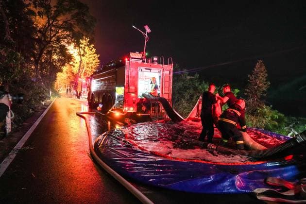 (260505) -- CHANGSHA, May 5, 2026 -- Rescuers work on site after an explosion at a fireworks plant in Guandu Town of Liuyang, central China s Hunan Province, May 5, 2026. Three people were killed, and 25 others were injured, including two in serious condition, after an explosion hit a fireworks plant in central China s Hunan Province on Monday, according to a local emergency management bureau. The explosion occurred at around 4:43 p.m. at the plant in Liuyang, a county-level city under Changsha, capital city of Hunan. After the accident, local emergency and fire rescue forces rushed to the scene to carry out rescue operations, which are still underway. ) (SpotNews) CHINA-HUNAN-LIUYANG-FIREWORKS PLANT-EXPLOSION (CN) ChenxSihan