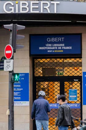 Paris, France May 4, 2026 - People walk past the Gibert Joseph bookstore on Boulevard Saint-Michel. The legendary bookstore in the Latin Quarter announced on April 28 that it had filed for bankruptcy protection. Facing financial difficulties, it is seeking to adapt its business model, at a time when one in five books purchased in France is secondhand. ECONOMIE, LIBRAIRIE GIBERT JOSEPH, ILLUSTRATION, GENERIQUE, RIVE GAUCHE, LIVRES, BANQUEROUTE, DIFFICULTES FINANCIERE, ENSEIGNE, LIBRAIRE, LECTURE, LIRE, REDRESSEMENT JUDICIAIRE, LECTEURS, LIVRES NEUFS, LIVRES D OCCASION, LIBRAIRIE INDEPENDANTE, COMMERCE EN LIGNE, ECOMMERCE Copyright: xVincentxIsorex