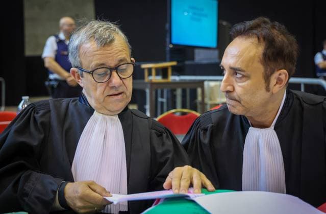 Lawyer Frank Discepoli, defending P. Falzone and Lawyer Fabrice Guttadauria, defending A. Falzone pictured during the second day of the trial of P. and A. Falzone, at the Court of Appeal of Mons, on Tuesday 05 May 2026. The trial of the two men concerns the 2022 tragedy in Strepy-Bracquegnies, where a car plowed into a carnival parade around 5:00. Six people died at the scene, and a seventh months later in the hospital. P. Falzone is charged with seven murder and 81 attempted murder. A. Falzone with failure to render aid to a person in danger.  VIRGINIExLEFOUR 172937349