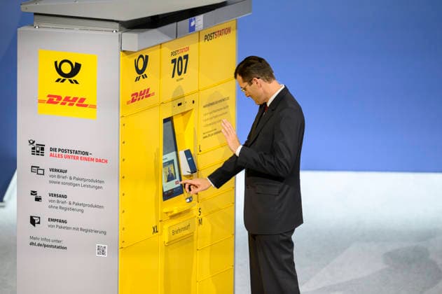 Tobias Meyer CEO, Chairman of the Board of Management demonstrates the functions of a Poststadion, talks to an employee via Poststadion Annual General Meeting of Deutsche Post AG, on 05 05 2026 in Bonn Germany @ World Conference Center