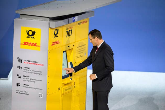 Tobias Meyer CEO, Chairman of the Board of Management demonstrates the functions of a Poststadion Annual General Meeting of Deutsche Post AG, on 05 05 2026 in Bonn Germany @ World Conference Center