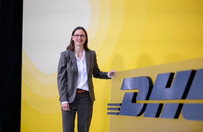 Katrin Suder Chairwoman of the Supervisory Board in front of a DHL logo Annual General Meeting of Deutsche Post AG, on 05 05 2026 in Bonn Germany @ World Conference Center