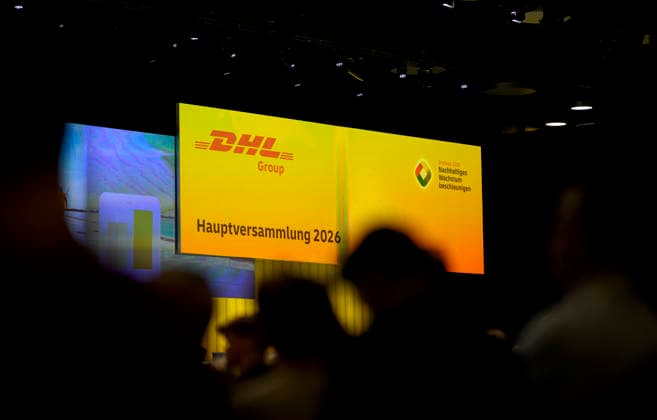 Feature, screen with the DHL logo and the lettering Annual General Meeting Annual General Meeting of Deutsche Post AG, on 05 05 2026 in Bonn Germany @ World Conference Center