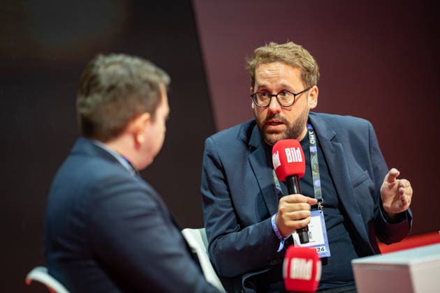 Paul Ronzheimer, journalist and podcaster during the recording of his podcast, together with his co-host Filipp Piatov OMR26 Festival in Hamburg, Hamburg Hamburg Germany Fair