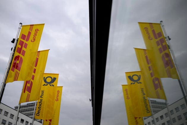 Banners and flags of DHL with logo in front of the HPV Annual General Meeting of Deutsche Post AG, on 05 05 2026 in Bonn Germany @ World Conference Center