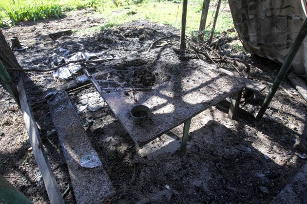 A fire-stricken gazebo is in the yard of a house damaged by a Russian drone strike in Dnipro, Ukraine, May 5, 2026. As a result of the attack, one person was injured. Three private houses and a critical infrastructure facility were also damaged in the city. (Photo by Mykola Miakshykov Ukrinform) Russian drone strike hits residential area in Dnipro  Copyright: xMykolaxMiakshykovx