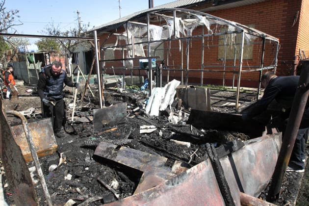 A man stands among debris in the yard hit by a Russian drone in Dnipro, Ukraine, May 5, 2026. As a result of the attack, one person was injured. Three private houses and a critical infrastructure facility were also damaged in the city. (Photo by Mykola Miakshykov Ukrinform) Russian drone strike hits residential area in Dnipro  Copyright: xMykolaxMiakshykovx