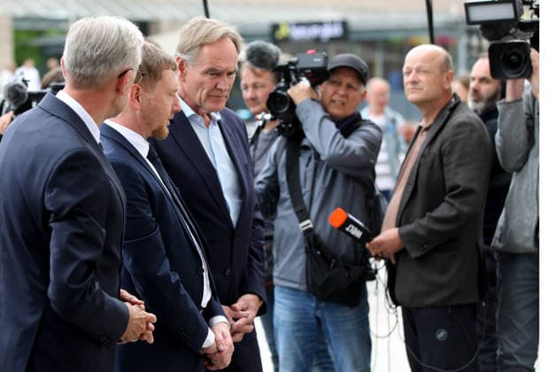 search for traces after amokfart in leipzig Leipzig , 05 05 2036 One day after Jeffrey K drove amok in Grimmaische Straße in downtown Leipzig, Armin Schuster, Minister of the Interior of Saxony, Michael Kretschmer, Prime Minister of Saxony, and Burghard Junge, Lord Mayor of Leipzig, visit the crime scene in Saxony Germany Copyright: xMatthiasxGränzdörferx