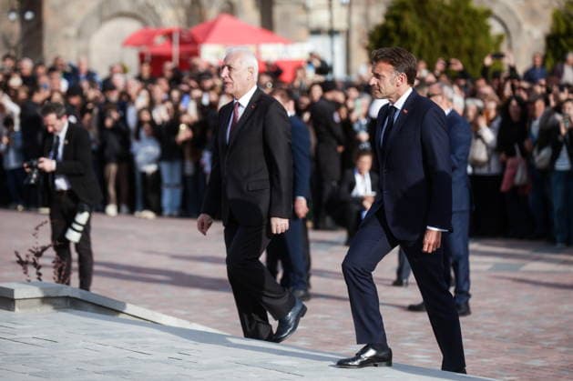 ARMENIA, GYUMRI - MAY 5, 2026: Emmanuel Macron, President of France, and his counterpart Vahagn Khachaturyan (R-L) of Armenia attend a ceremony to lay flowers at the memorial to the 1988 Spitak earthquake titled For the Innocent Victims, For the Merciful Hearts and situated in Vardanants Square Gyumri Armenia  - ZUMAt113 20260505_zaa_t113_306 Copyright: xAlexanderxPatrinx