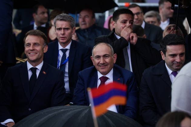 ARMENIA, GYUMRI - MAY 5, 2026: Emmanuel Macron, President of France, Nikol Pashinyan, Prime Minister of Armenia, and National Assembly Speaker Alen Simonyan (L-R) attend a concert titled Musical Bridge: Armenia - France and held in Vardanants Square to mark friendship between the two countries. Alexander Patrin TASS  92082331