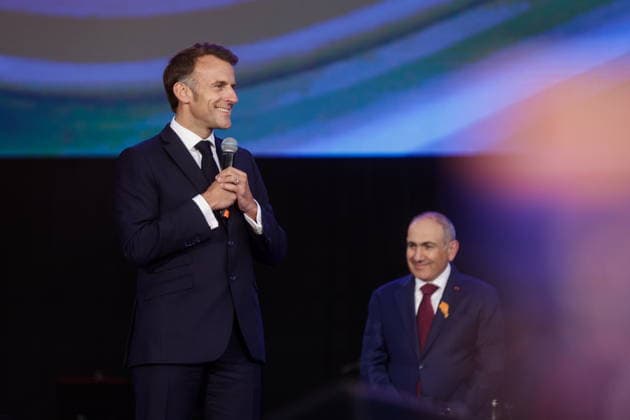 ARMENIA, GYUMRI - MAY 5, 2026: Emmanuel Macron (L), President of France, and Nikol Pashinyan, Prime Minister of Armenia, appear on stage during a concert titled Musical Bridge: Armenia - France and held in Vardanants Square to mark friendship between the two countries. Alexander Patrin TASS  92082953