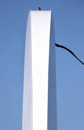 May 5, 2026, Washington, District Of Columbia, USA: Activist Guido Reichstadter sits atop the Frederick Douglass Memorial Bridge as protesters below hold Iranian and Palestinian flags in Washington DC, USA, on May 05, 2026. Reichstadter climbed onto the bridge on May 1 and has remained there in protest of what he described as the Trump regime s war in Iran and against AI development. Washington USA - ZUMAs337 20260505_znp_s337_011 Copyright: xGentxShkullakux