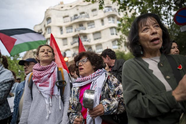 Protesters gather outside the EU offices over detention of Freedom Flotilla activists in Barcelona BARCELONA, SPAIN - MAY 05: Protesters, carrying Palestinian flags and signs, gather outside the European Commission headquarters to protest against the continued detention of Freedom Flotilla activists Saif Abukeshek and Thiago Avila by Israeli authorities in Barcelona, Spain, on May 5, 2026. During the rally, speakers also criticized the European Union for what they called its silence regarding the situation of the two activists chanting against the Israeli government and in support of Palestine were heard throughout the protest. Lorena Sopena Lopez Anadolu Barcelona Spain. Editorial use only. Please get in touch for any other usage.  Copyright: x2026xAnadoluxLorenaxSopenaxLopezx