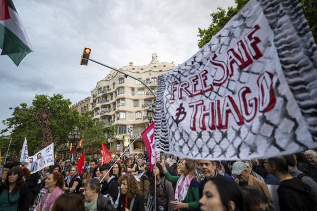 Protesters gather outside the EU offices over detention of Freedom Flotilla activists in Barcelona BARCELONA, SPAIN - MAY 05: Protesters, carrying Palestinian flags and signs, gather outside the European Commission headquarters to protest against the continued detention of Freedom Flotilla activists Saif Abukeshek and Thiago Avila by Israeli authorities in Barcelona, Spain, on May 5, 2026. During the rally, speakers also criticized the European Union for what they called its silence regarding the situation of the two activists chanting against the Israeli government and in support of Palestine were heard throughout the protest. Lorena Sopena Lopez Anadolu Barcelona Spain. Editorial use only. Please get in touch for any other usage.  Copyright: x2026xAnadoluxLorenaxSopenaxLopezx