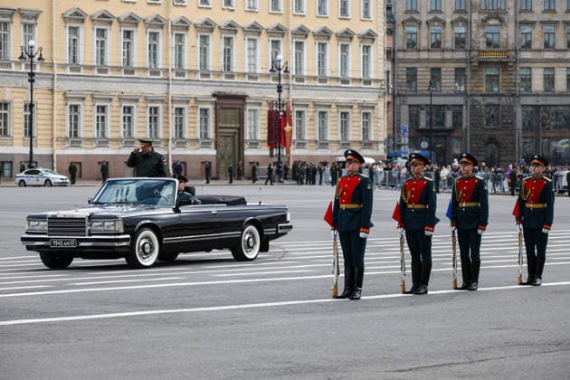 May 5, 2026, St. Petersburg, Russia: A black open-top parade car drives across Palace Square past a unit of the military honor guard during a technical rehearsal for the 81st Victory Day Parade. The rehearsal of parade units on foot took place on Palace Square in St. Petersburg in preparation for the 81st anniversary of Victory in the Great Patriotic War. Units of the Leningrad Military District, cadets from military academies, and representatives of law enforcement agencies participated in the training. The specialists practiced their marching skills and drill techniques accompanied by a combined military orchestra. On May 9, 1945 (Moscow time), the Act of Unconditional Surrender of Germany came into force. For city residents, this date is  - ZUMAs197 20260505_aaa_s197_245 Copyright: xArtemxPriakhinx