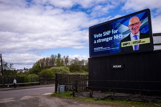 Images before the Scottish elections in Edinburgh, UK - 05 May 2026 A billboard promoting the governing Scottish National Party (SNP) is seen on the road. A collection of illustrative photographs made before the Scottish Parliamentary elections. On the 7th May 2026, voters in Scotland will choose their next government in an election that is being seen as the firing of a starting pistol for a renewed push for Scottish Independence. Current polls show the Independence-supporting parties, the SNP and the Greens will form a majority bloc. In the event of their victory, the SNP state that on day one, they will table a motion to schedule a future independence referendum. Edinburgh United Kingdom Copyright: xNeilxMiltonx xSOPAxImagesx L1009967