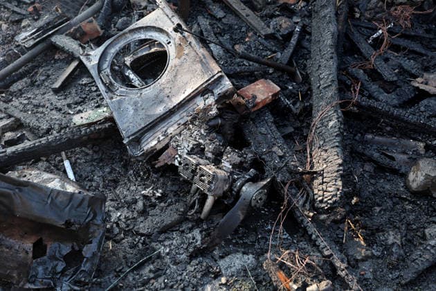 The engine of a Russian strike drone lies among the fire-stricken debris outside a private house, Kharkiv, Ukraine, May 6, 2026. On Wednesday morning, Russian troops attacked Kharkiv with Shahed-type drones. Strikes on residential areas in the Novobavarskyi and Shevchenkivskyi districts injured two people. (Photo by Viacheslav Madiievskyi Ukrinform) Russian drone destroys house in Kharkiv  Copyright: xViacheslavxMadiievskyix