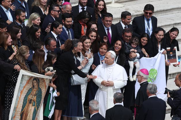 Vatican City - Italy, May 6, 2026: At the end of the ceremony, Pope Leo XIV greeted the faithful. He presided over the Wednesday General Audience in St. Peter s Square, the day after US President Donald Trump s comments against him, accusing him of endangering Catholics around the world. This morning, thousands of faithful and pilgrims from around the world gathered in St. Peter s Square to participate in the Wednesday General Audience with Pope Leo XIV. A moment of prayer, listening, and communion filled the square with hope, reflection, and joy.  Copyright: xmarcoxiacobuccix xipa-agency.netx xmarcoxiacobuccix IPA_Agency_IPA74466204