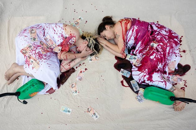 Climate Activists Pour Fake Blood over Protesters at Mock Petrol Pump outside Shell Centre, London, UK 6 May 2026 Activists lie on the ground in front of a mock petrol pump reading Oil Profit$$$ for Oil Bo$$es as they are doused in red liquid resembling blood outside the Shell Centre, London, UK, on 6 May 2026, during a Fossil Free London protest targeting Shell ahead of an expected jump in quarterly profits amid the US-Iran conflict., Credit:Pete Speller Avalon London, United Kingdom  Copyright: xPetexSpellerx xAvalonx 1096871577
