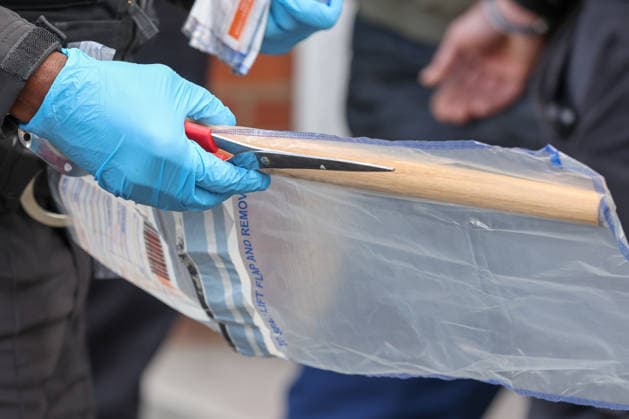 May 6, 2026, London, London, UK: London, UK. A weapon is placed in an evidence bag as a police officer holds scissors while a man is detained during a patrol in Stamford Hill, north London, as the Metropolitan Police announce a new 100-officer Community Protection Team to boost visibility and safeguard Jewish communities following recent antisemitic hate crime. London UK  - ZUMAl94_ 20260506_zaf_l94_019 Copyright: xDinendraxHariax