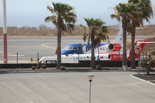 (260506) -- PRAIA, May 6, 2026 -- Aircraft involved in the evacuation of passengers suspected of hantavirus infection park on the tarmac at Nelson Mandela International Airport in Praia, Cabo Verde, on May 6, 2026. Cabo Verde on Wednesday carried out an air evacuation of three passengers suspected of hantavirus infection from the Dutch cruise ship MV Hondius, which had been anchored off the capital, Praia. The evacuation was conducted under strict security and health protocols, with personnel from the national police and public health services deployed from the Port of Praia to Nelson Mandela International Airport on Santiago Island. The three passengers were transferred by air ambulance, with the two aircraft departing at 10:55 a. 