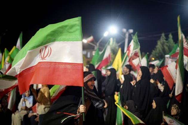 May 6, 2026, Iran, Iran: Pro-government supporters wave national flags during a state-organized rally, amid a ceasefire in the conflict involving Iran, the United States, and Israel. The United Kingdom, France, Germany, and Saudi Arabia called for de-escalation in the Middle East following reported attacks on May 4 on the United Arab Emirates. Iran s chief negotiator in talks with the United States warned on May 5 that his country has not even started in its standoff over the Strait of Hormuz. The United States and Pakistan, a key mediator in the Middle East war, expressed new hope of talks leading to a peace deal with Iran on May 6, after President Donald Trump halted a plan to guide ships through the Strait of Hormuz. Iran Iran - ZUMAi98_ 20260506_zih_i98_006 Copyright: xIranianxSupremexLeader SxOfficex