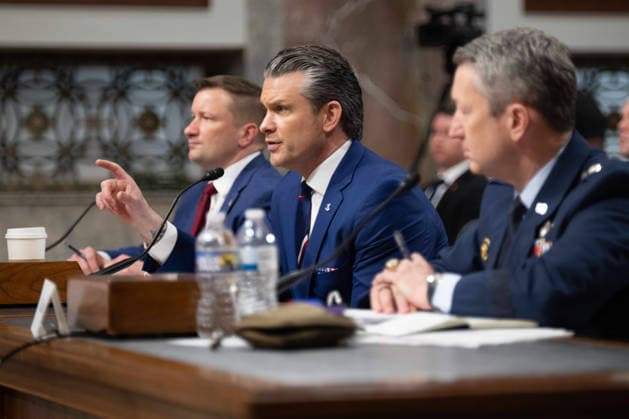 May 6, 2026, Washington, Dc, United States of America: U.S. Secretary of Defense Pete Hegseth, center, responds to a question during testimony before the Senate Armed Services Committee on Capitol Hill, April 30, 2026 in Washington, D.C. Sitting from left: Pentagon Chief Financial Officer Jules Hurst III, Defense Secretary Pete Hegseth and Chairman of the Joint Chiefs Gen. Dan Caine. Washington United States of America - ZUMAp138 20260506_zaa_p138_025 Copyright: xPo1xEricxBrann Dodx