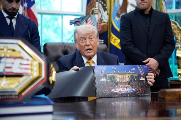 President Donald Trump, flanked by group of UFC fighters, speaks in the Oval Office of the White House in Washington, DC on Wednesday, May 6, 2026.  WASP20260506120 YurixGripas