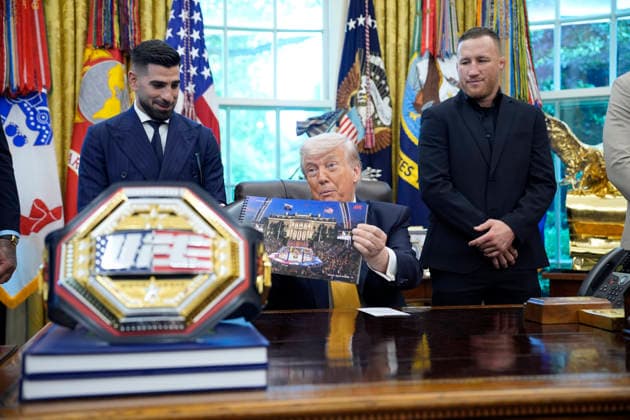 President Donald Trump, flanked by group of UFC fighters, speaks in the Oval Office of the White House in Washington, DC on Wednesday, May 6, 2026.  WASP20260506121 YurixGripas