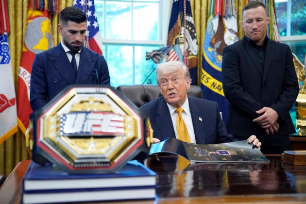 President Donald Trump, flanked by group of UFC fighters, speaks in the Oval Office of the White House in Washington, DC on Wednesday, May 6, 2026.  WASP20260506123 YurixGripas