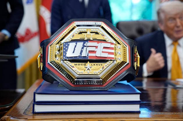 President Donald Trump, flanked by group of UFC fighters, speaks in the Oval Office of the White House in Washington, DC on Wednesday, May 6, 2026.  WASP20260506127 YurixGripas