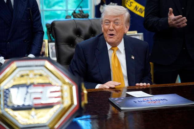 President Donald Trump, flanked by group of UFC fighters, speaks in the Oval Office of the White House in Washington, DC on Wednesday, May 6, 2026.  WASP20260506124 YurixGripas