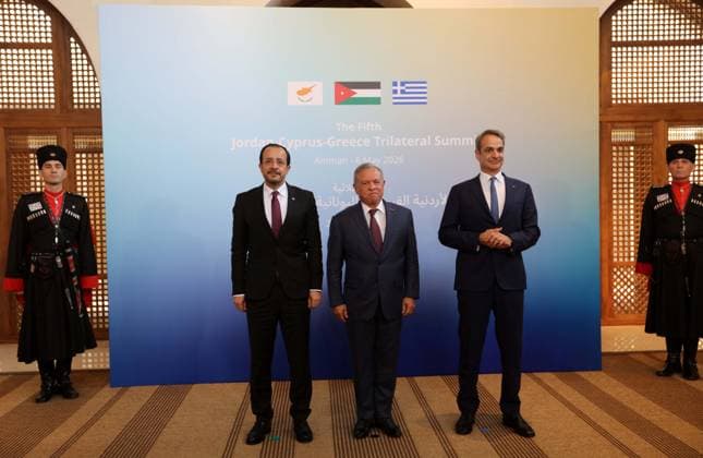 (260506) -- AMMAN, May 6, 2026 -- Jordan s King Abdullah II (C), Cypriot President Nikos Christodoulides (L) and Greek Prime Minister Kyriakos Mitsotakis (R) pose to take photo in Amman, Jordan, May 6, 2026. The fifth Jordan-Cyprus-Greece trilateral summit was held here Wednesday, focusing on their cooperation and regional developments, read a statement released by Jordan s Royal Hashemite Court. (Photo by Xinhua) JORDAN-AMMAN-JORDAN-CYPRUS-GREECE-TRILATERAL SUMMIT MohammadxAbuxGhosh 