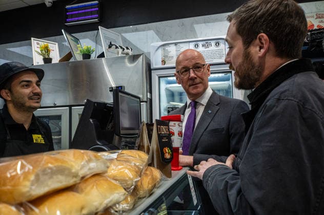 First Minister of Scotland John Swinney joins SNP candidate Alex Kerr campaigning in Hamilton - 06 May 2026 First Minister of Scotland John Swinney (centre) and SNP candidate Alex Kerr visit a local butcher during a campaign stop. The day before the Scottish parliamentary elections, First Minister of Scotland John Swinney visits Hamilton in South Lanarkshire, the constituency of SNP candidate Alex Kerr to kick off the final day of campaigning by meeting potential voters and owners of local businesses. Hamilton United Kingdom Copyright: xNeilxMiltonx xSOPAxImagesx L1000711