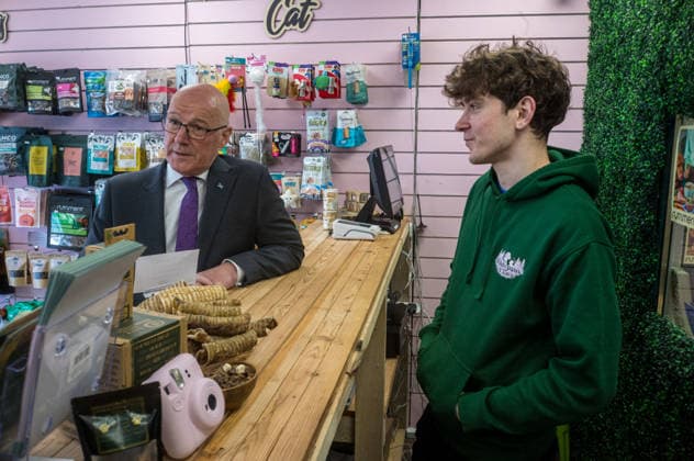 First Minister of Scotland John Swinney joins SNP candidate Alex Kerr campaigning in Hamilton - 06 May 2026 First Minister of Scotland John Swinney (left) visits a local pet food store while campaigning. The day before the Scottish parliamentary elections, First Minister of Scotland John Swinney visits Hamilton in South Lanarkshire, the constituency of SNP candidate Alex Kerr to kick off the final day of campaigning by meeting potential voters and owners of local businesses. Hamilton United Kingdom Copyright: xNeilxMiltonx xSOPAxImagesx L1000962