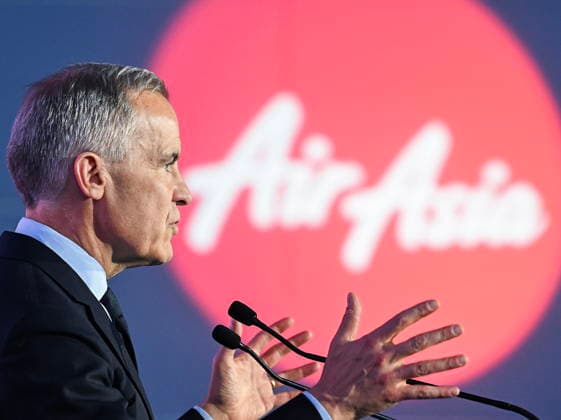 May 6, 2026, Mirabel, Pq, Canada: Prime Minister Mark Carney speaks during an event at the Airbus A220 Delivery Center in Mirabel, Que., Wednesday, May 6, 2026, where AirAsia placed a landmark order for 150 Airbus A220 aircraft. Mirabel Canada  - ZUMAc35_ 20260506_zaf_c35_135 Copyright: xGrahamxHughesx