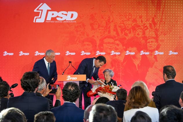 May 6, 2026, Lisbon, Lisbon, Portugal: Former Portuguese President MARCELO REBELO DE SOUSA (L) offers a bouquet of flowers and PSD President and Prime Minister LUoÂS MONTENEGRO (R) shows a commemorative bag to party member number two CONCEIo¡oÆ’O MONTEIRO (C) during the 52nd anniversary celebrations of the Social Democratic Party PSD in Lisbon. Lisbon Portugal - ZUMAr238 20260506_zip_r238_004 Copyright: xRicardoxRochax