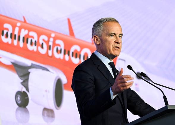 May 6, 2026, Mirabel, Pq, Canada: Prime Minister Mark Carney speaks during an event at the Airbus A220 Delivery Center in Mirabel, Que., Wednesday, May 6, 2026, where AirAsia placed a landmark order for 150 Airbus A220 aircraft. Mirabel Canada  - ZUMAc35_ 20260506_zaf_c35_175 Copyright: xGrahamxHughesx