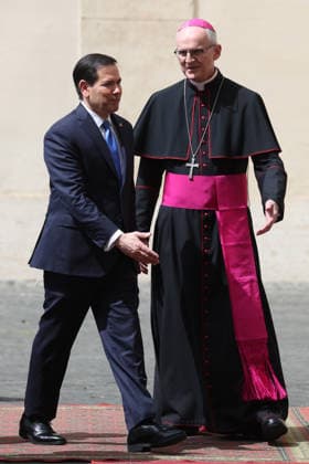Vatican City, May 7, 2026: U.S. Secretary of State Marco Rubio and his wife, Jeanette Dousdebes Rubio, arrive in the San Damaso Courtyard, where they were received by Apostolic Nuncio Petar Rajic for an official meeting with Pope Leo XIV and Cardinal Pietro Parolin. The visit takes place in a particularly delicate diplomatic climate, following Donald Trump s recent statements against the Pontiff, which have attracted the attention of the international community and global media. The meeting thus takes on strong symbolic and institutional significance, focusing on the dialogue between the Holy See and the United States, geopolitical tensions, and the role of Vatican diplomacy in the contemporary landscape.  Copyright: xmarcoxiacobuccix xipa-agency.netx xmarcoxiacobuccix IPA_Agency_IPA74485806