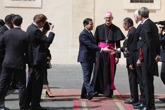 Vatican City, May 7, 2026: U.S. Secretary of State Marco Rubio and his wife, Jeanette Dousdebes Rubio, arrive in the San Damaso Courtyard, where they were received by Apostolic Nuncio Petar Rajic for an official meeting with Pope Leo XIV and Cardinal Pietro Parolin. The visit takes place in a particularly delicate diplomatic climate, following Donald Trump s recent statements against the Pontiff, which have attracted the attention of the international community and global media. The meeting thus takes on strong symbolic and institutional significance, focusing on the dialogue between the Holy See and the United States, geopolitical tensions, and the role of Vatican diplomacy in the contemporary landscape.  Copyright: xmarcoxiacobuccix xipa-agency.netx xmarcoxiacobuccix IPA_Agency_IPA74485807