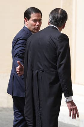 Vatican City, May 7, 2026: U.S. Secretary of State Marco Rubio and his wife, Jeanette Dousdebes Rubio, arrive in the San Damaso Courtyard, where they were received by Apostolic Nuncio Petar Rajic for an official meeting with Pope Leo XIV and Cardinal Pietro Parolin. The visit takes place in a particularly delicate diplomatic climate, following Donald Trump s recent statements against the Pontiff, which have attracted the attention of the international community and global media. The meeting thus takes on strong symbolic and institutional significance, focusing on the dialogue between the Holy See and the United States, geopolitical tensions, and the role of Vatican diplomacy in the contemporary landscape.  Copyright: xmarcoxiacobuccix xipa-agency.netx xmarcoxiacobuccix IPA_Agency_IPA74485827