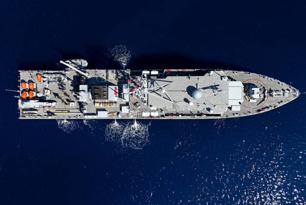 EFES-2026 Exercise in Izmir IZMIR, TURKIYE - MAY 07: An aerial view show Aydin-class mine hunter ship TCG Akcay (M-270) maneuvers in the deep blue sea, creating a large white wake and foam trail during a mine hunting operation as part of the EFES-2026 Exercise in Izmir on May 7, 2026. Conducted by the Turkish Armed Forces (TSK), the tactical exercise involved the detection and successful destruction of maritime mines to ensure safe passage in the region. Berkan Cetin Anadolu Izmir Turkey. Editorial use only. Please get in touch for any other usage.  Copyright: x2026xAnadoluxBerkanxCetinx