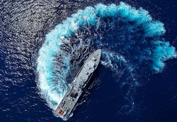 EFES-2026 Exercise in Izmir IZMIR, TURKIYE - MAY 07: An aerial view show Aydin-class mine hunter ship TCG Akcay (M-270) maneuvers in the deep blue sea, creating a large white wake and foam trail during a mine hunting operation as part of the EFES-2026 Exercise in Izmir on May 7, 2026. Conducted by the Turkish Armed Forces (TSK), the tactical exercise involved the detection and successful destruction of maritime mines to ensure safe passage in the region. Berkan Cetin Anadolu Izmir Turkey. Editorial use only. Please get in touch for any other usage.  Copyright: x2026xAnadoluxBerkanxCetinx