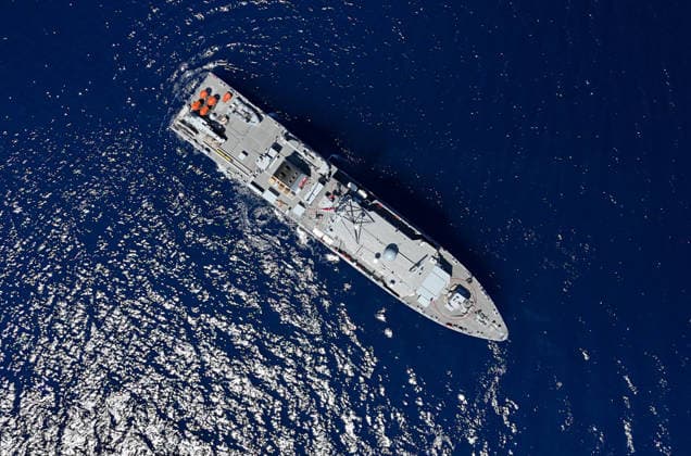 EFES-2026 Exercise in Izmir IZMIR, TURKIYE - MAY 07: An aerial view show Aydin-class mine hunter ship TCG Akcay (M-270) maneuvers in the deep blue sea, creating a large white wake and foam trail during a mine hunting operation as part of the EFES-2026 Exercise in Izmir on May 7, 2026. Conducted by the Turkish Armed Forces (TSK), the tactical exercise involved the detection and successful destruction of maritime mines to ensure safe passage in the region. Berkan Cetin Anadolu Izmir Turkey. Editorial use only. Please get in touch for any other usage.  Copyright: x2026xAnadoluxBerkanxCetinx