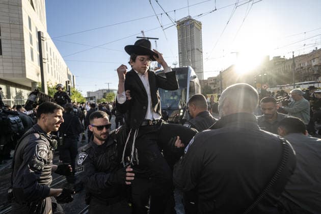 Ultra-Orthodox Jews protest mandatory military service in Jerusalem JERUSALEM - MAY 7: Israeli police use water cannons to disperse Ultra-Orthodox Jewish (Haredi) protesters blocking roads by lying on the ground during a demonstration against the arrest of several yeshiva students over mandatory military service in West Jerusalem on May 7, 2026. Mostafa Alkharouf Anadolu Jerusalem Israel. Editorial use only. Please get in touch for any other usage.  Copyright: x2026xAnadoluxMostafaxAlkharoufx