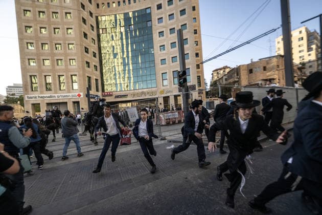 Ultra-Orthodox Jews protest mandatory military service in Jerusalem JERUSALEM - MAY 7: Israeli police use water cannons to disperse Ultra-Orthodox Jewish (Haredi) protesters blocking roads by lying on the ground during a demonstration against the arrest of several yeshiva students over mandatory military service in West Jerusalem on May 7, 2026. Mostafa Alkharouf Anadolu Jerusalem Israel. Editorial use only. Please get in touch for any other usage.  Copyright: x2026xAnadoluxMostafaxAlkharoufx