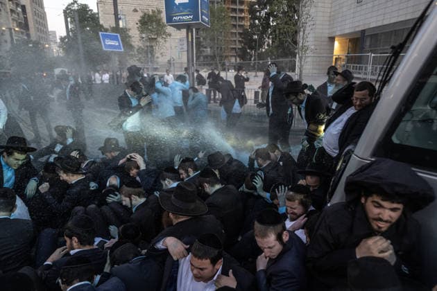 Ultra-Orthodox Jews protest mandatory military service in Jerusalem JERUSALEM - MAY 7: Israeli police use water cannons to disperse Ultra-Orthodox Jewish (Haredi) protesters blocking roads by lying on the ground during a demonstration against the arrest of several yeshiva students over mandatory military service in West Jerusalem on May 7, 2026. Mostafa Alkharouf Anadolu Jerusalem Israel. Editorial use only. Please get in touch for any other usage.  Copyright: x2026xAnadoluxMostafaxAlkharoufx